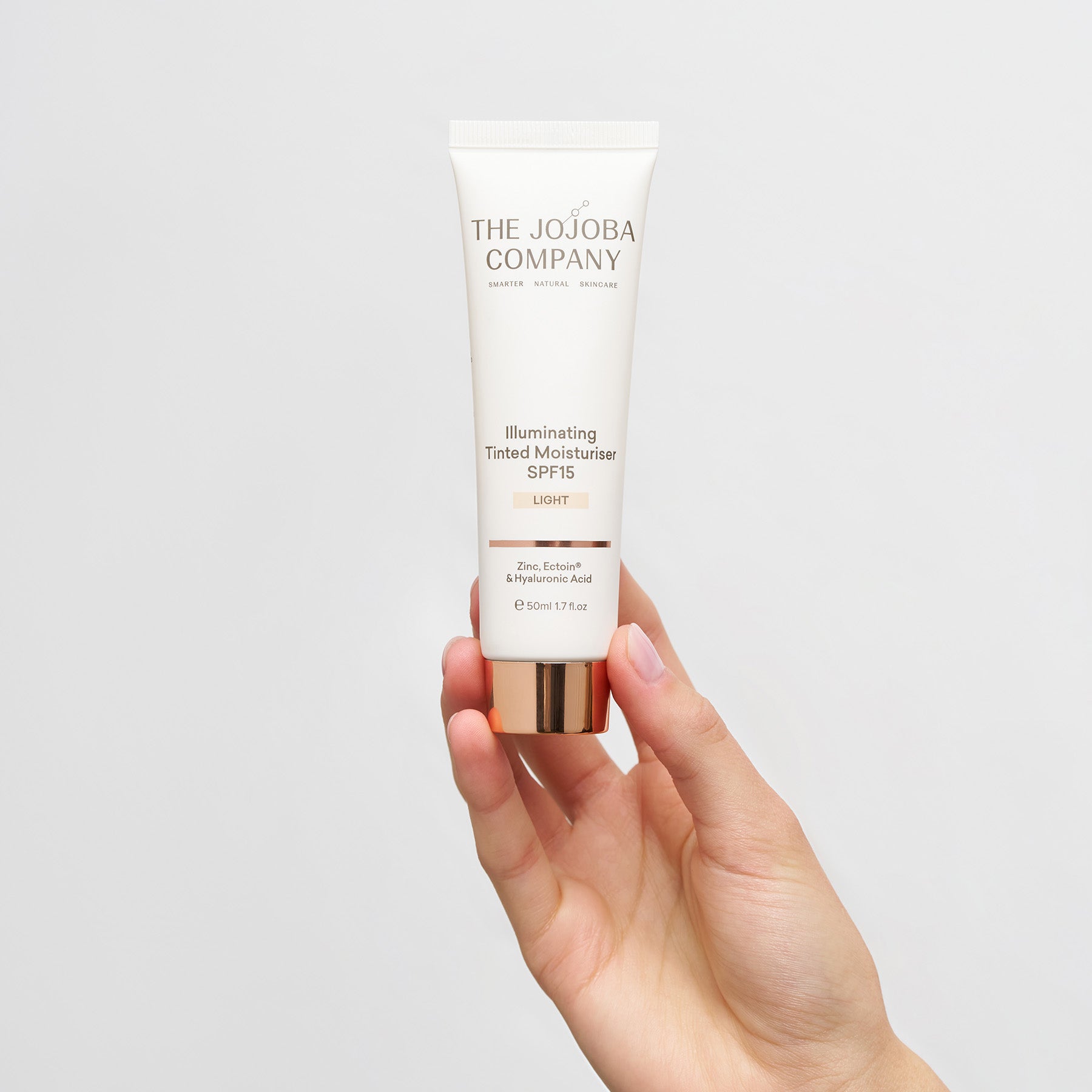 The Jojoba Company The Jojoba Company Illuminating Tinted Moisturiser SPF15 50ml - Light Skin Care
